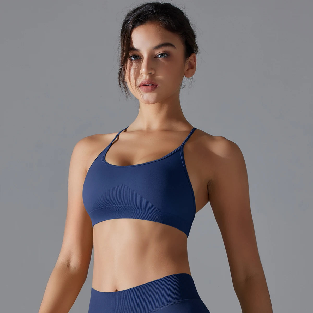 VM Fitness Running Workout Sports Bra SPECIFICATIONSAge: Middle AgeBrand Name: RooftrellenCN: ZhejiangChoice: yesClothing Length: regularCraft of Weaving: KnitDecoration: Hollow OutElasticity: High StrecthFabric Type: BroadclothGender: WomenHigh-concerned