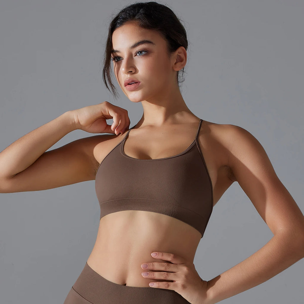 VM Fitness Running Workout Sports Bra SPECIFICATIONSAge: Middle AgeBrand Name: RooftrellenCN: ZhejiangChoice: yesClothing Length: regularCraft of Weaving: KnitDecoration: Hollow OutElasticity: High StrecthFabric Type: BroadclothGender: WomenHigh-concerned