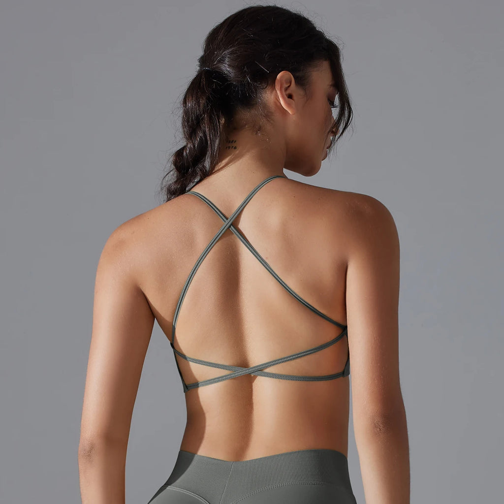VM Fitness Running Workout Sports Bra SPECIFICATIONSAge: Middle AgeBrand Name: RooftrellenCN: ZhejiangChoice: yesClothing Length: regularCraft of Weaving: KnitDecoration: Hollow OutElasticity: High StrecthFabric Type: BroadclothGender: WomenHigh-concerned