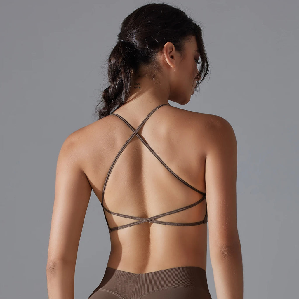 VM Fitness Running Workout Sports Bra SPECIFICATIONSAge: Middle AgeBrand Name: RooftrellenCN: ZhejiangChoice: yesClothing Length: regularCraft of Weaving: KnitDecoration: Hollow OutElasticity: High StrecthFabric Type: BroadclothGender: WomenHigh-concerned