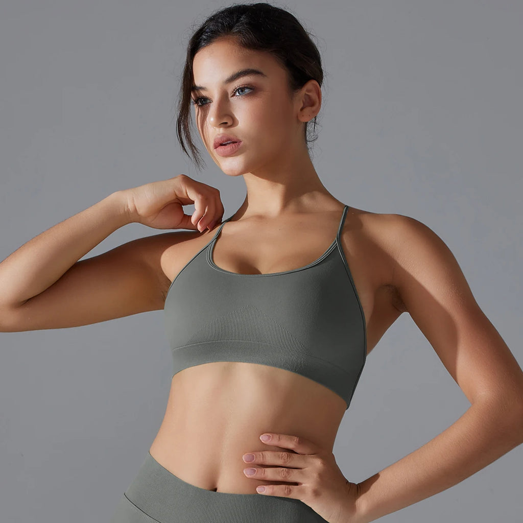 VM Fitness Running Workout Sports Bra SPECIFICATIONSAge: Middle AgeBrand Name: RooftrellenCN: ZhejiangChoice: yesClothing Length: regularCraft of Weaving: KnitDecoration: Hollow OutElasticity: High StrecthFabric Type: BroadclothGender: WomenHigh-concerned