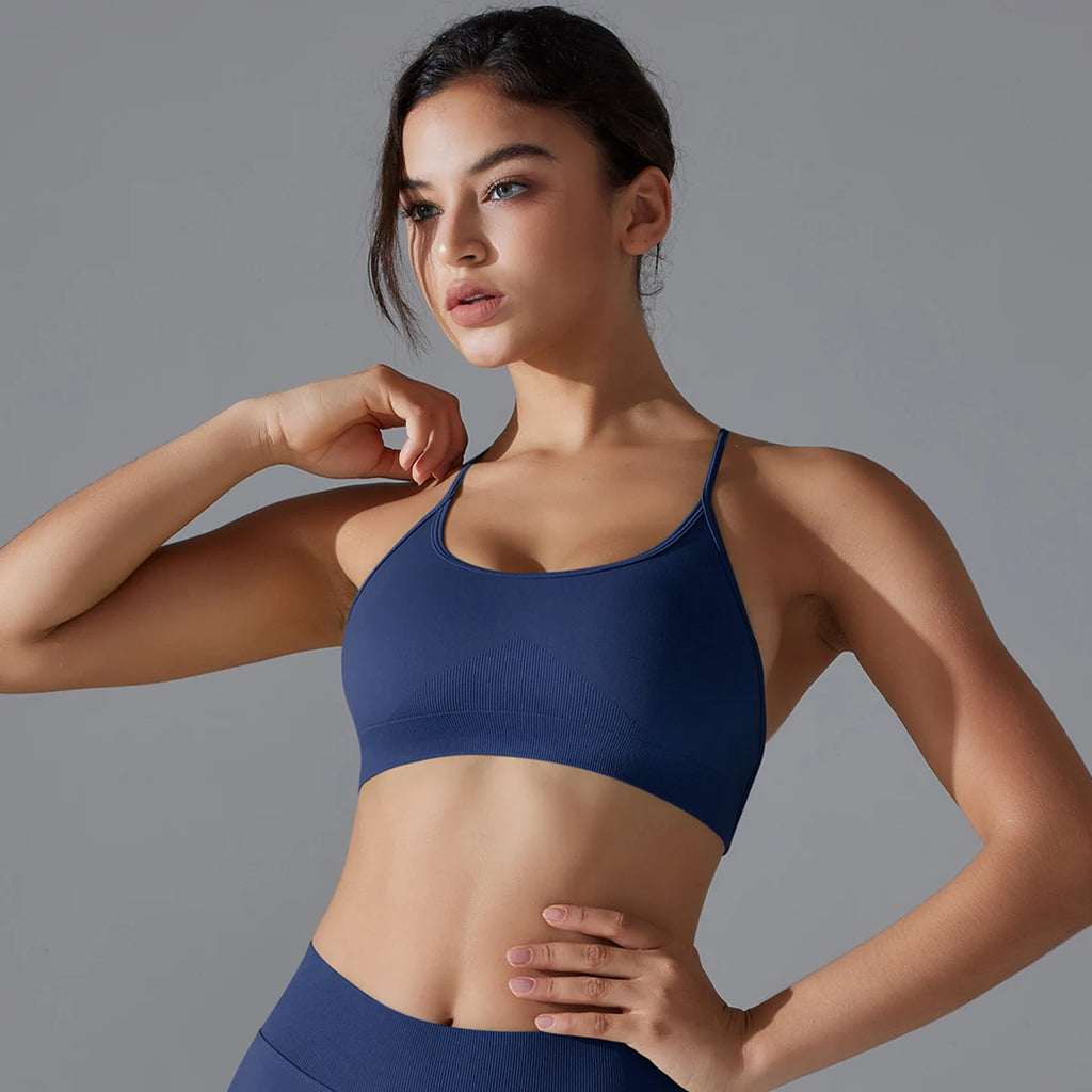 VM Fitness Running Workout Sports Bra SPECIFICATIONSAge: Middle AgeBrand Name: RooftrellenCN: ZhejiangChoice: yesClothing Length: regularCraft of Weaving: KnitDecoration: Hollow OutElasticity: High StrecthFabric Type: BroadclothGender: WomenHigh-concerned
