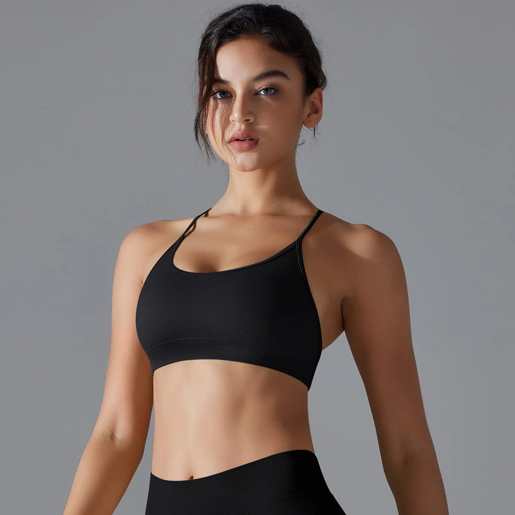 VM Fitness Running Workout Sports Bra SPECIFICATIONSAge: Middle AgeBrand Name: RooftrellenCN: ZhejiangChoice: yesClothing Length: regularCraft of Weaving: KnitDecoration: Hollow OutElasticity: High StrecthFabric Type: BroadclothGender: WomenHigh-concerned