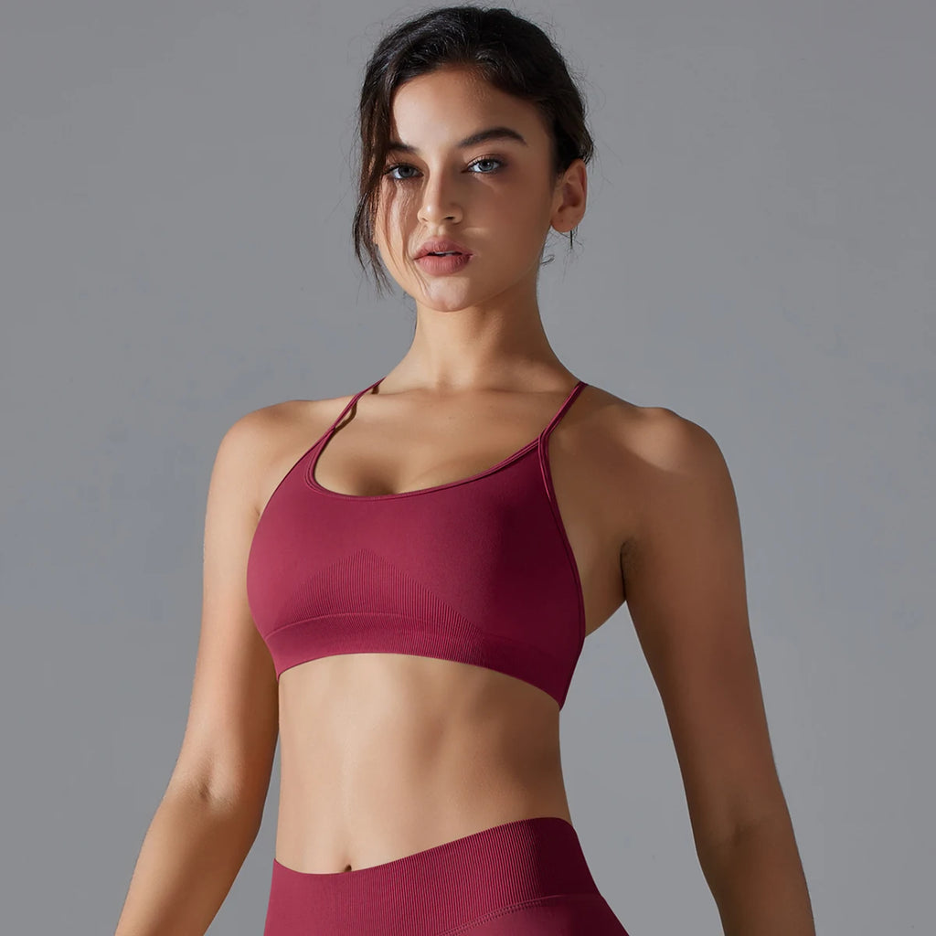 VM Fitness Running Workout Sports Bra SPECIFICATIONSAge: Middle AgeBrand Name: RooftrellenCN: ZhejiangChoice: yesClothing Length: regularCraft of Weaving: KnitDecoration: Hollow OutElasticity: High StrecthFabric Type: BroadclothGender: WomenHigh-concerned