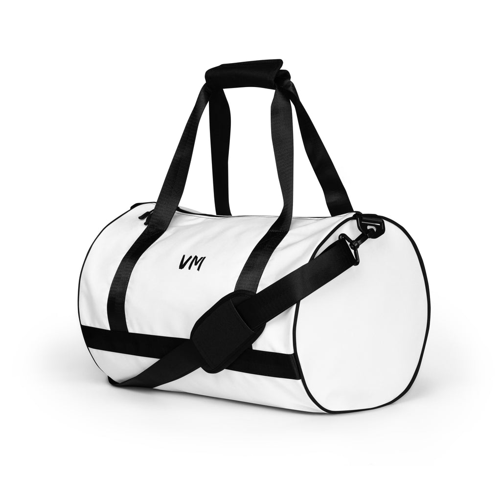 VM Spacial Version Gym Bag Ready to get your fitness on? Add some punch to pumping iron with this all-over print gym bag. Made from 100% polyester and sturdy, water-resistant fabric, this bag is fun meets function. And it’s got pockets! • 100% polyester •