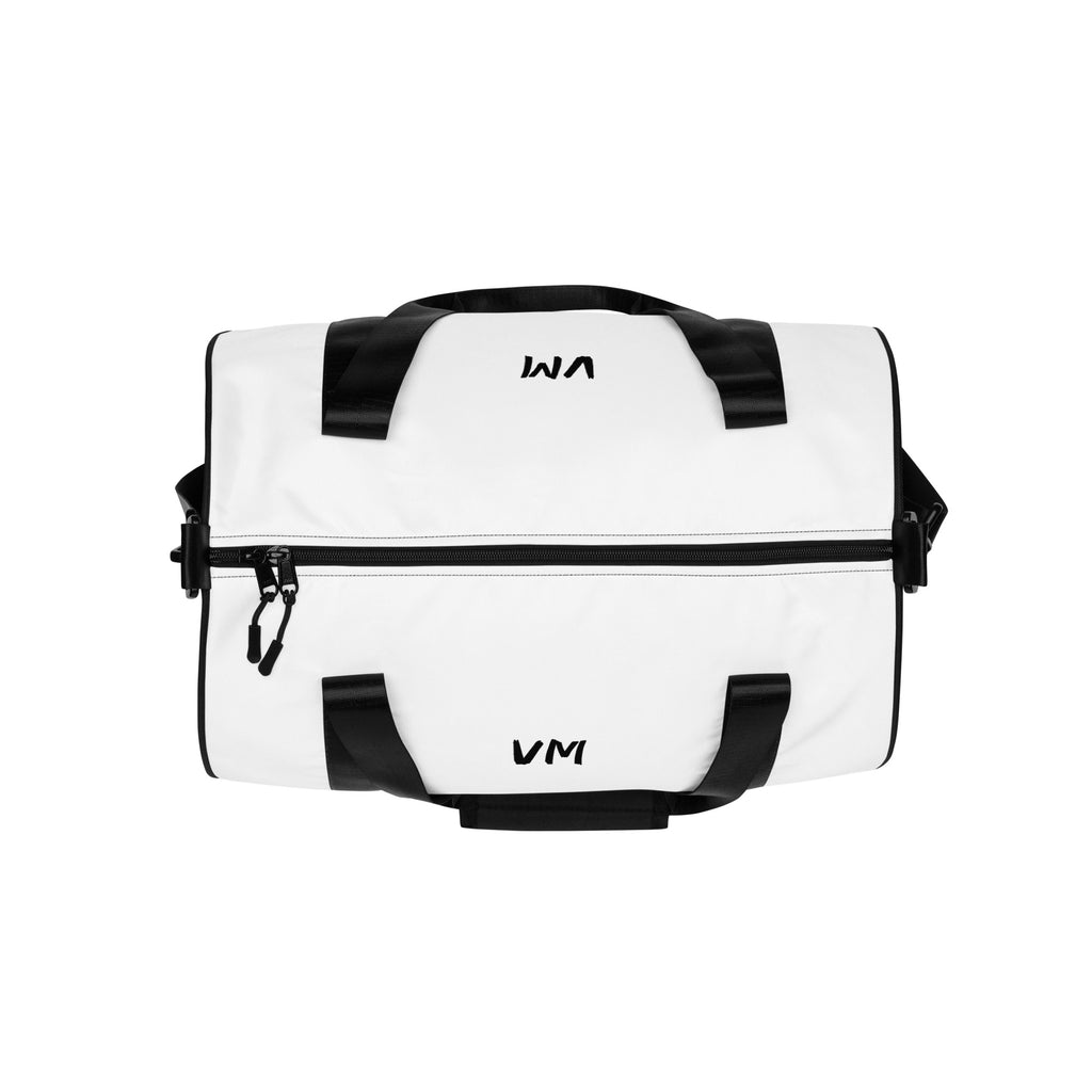 VM Spacial Version Gym Bag Ready to get your fitness on? Add some punch to pumping iron with this all-over print gym bag. Made from 100% polyester and sturdy, water-resistant fabric, this bag is fun meets function. And it’s got pockets! • 100% polyester •