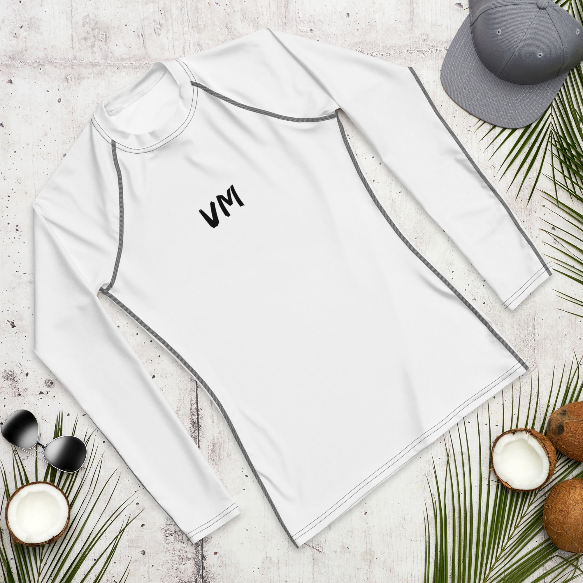 VM Official Long Sleeve Rash Guard Don’t let sunburn, wind, sand, or other elements ruin your day! This smooth and versatile long-sleeve rash guard will protect you while you have fun doing sports. It is slim-fitted with flat ergonomic seams, and a bit lo