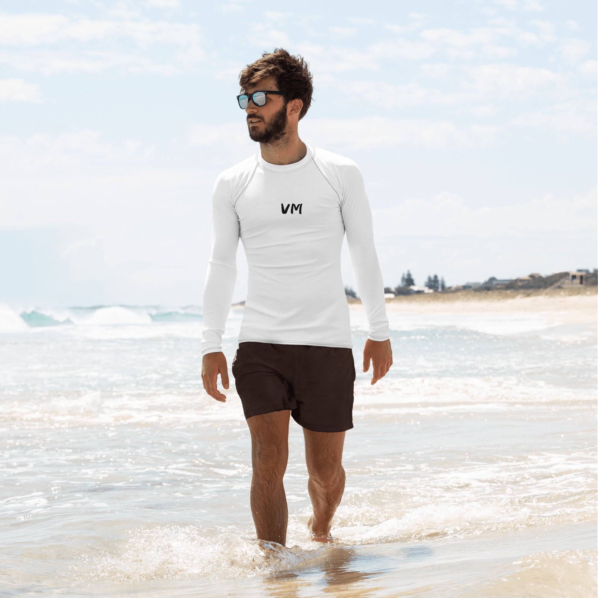 VM Official Long Sleeve Rash Guard Don’t let sunburn, wind, sand, or other elements ruin your day! This smooth and versatile long-sleeve rash guard will protect you while you have fun doing sports. It is slim-fitted with flat ergonomic seams, and a bit lo
