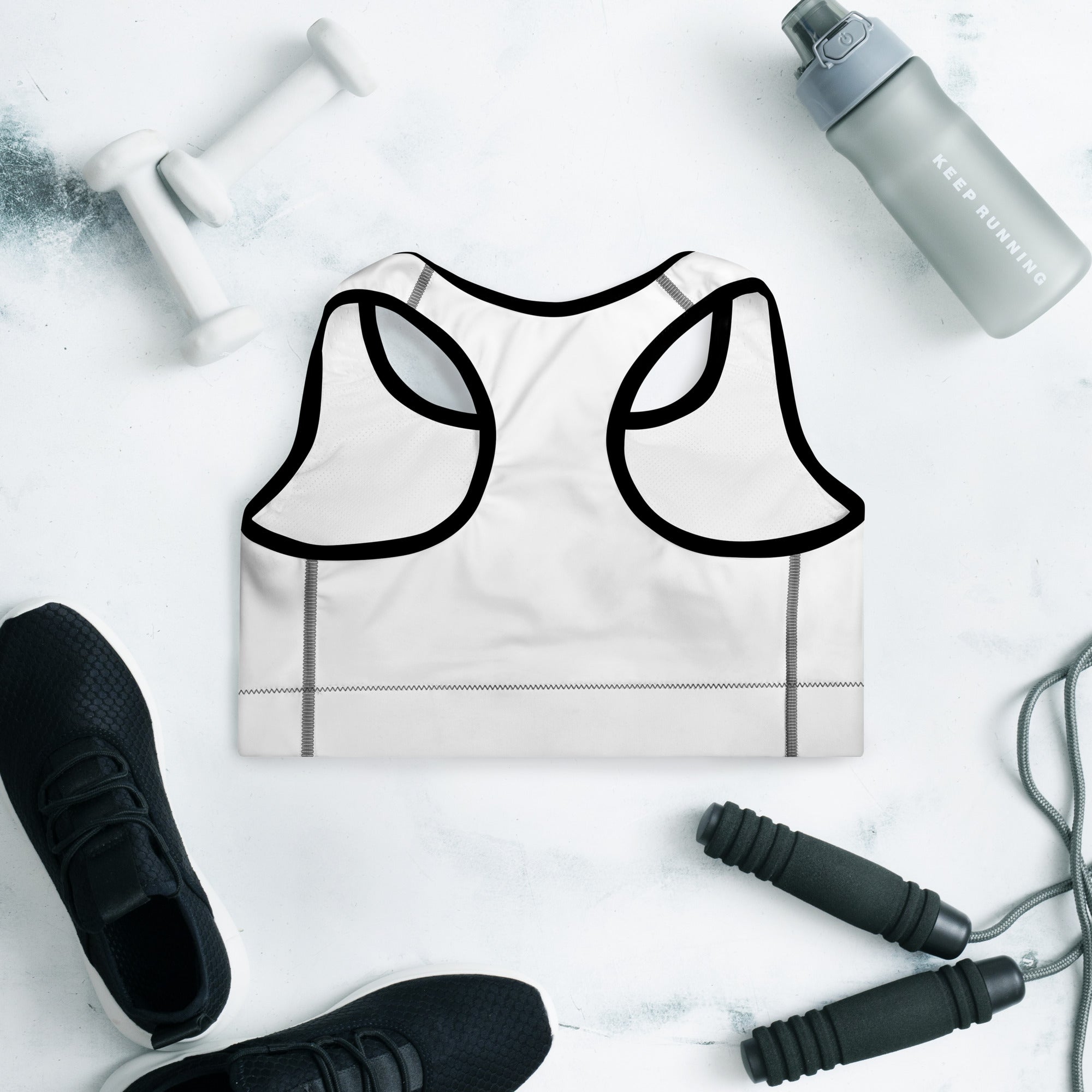 VM's Padded Sports Bra Get the perfect bra for your workouts! This comfy bra has a soft moisture-wicking fabric, extra materials in shoulder straps, and removable padding for maximum support. • 75% recycled polyester, 25% elastane for production in the US