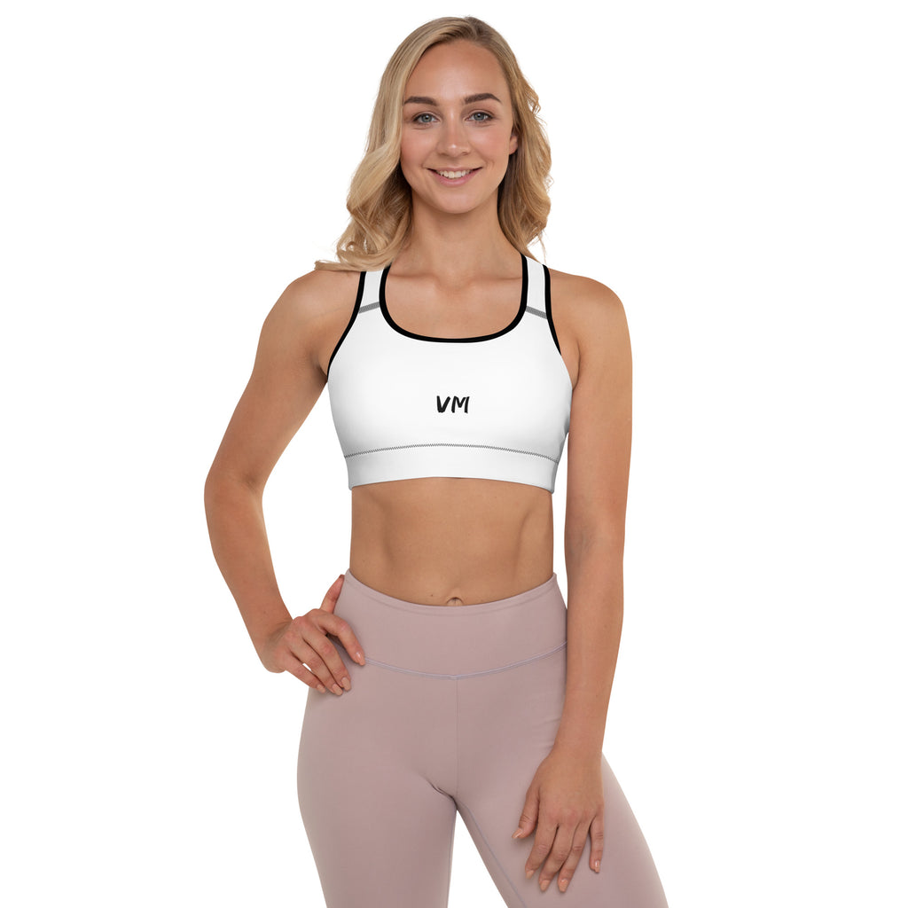 VM's Padded Sports Bra Get the perfect bra for your workouts! This comfy bra has a soft moisture-wicking fabric, extra materials in shoulder straps, and removable padding for maximum support. • 75% recycled polyester, 25% elastane for production in the US