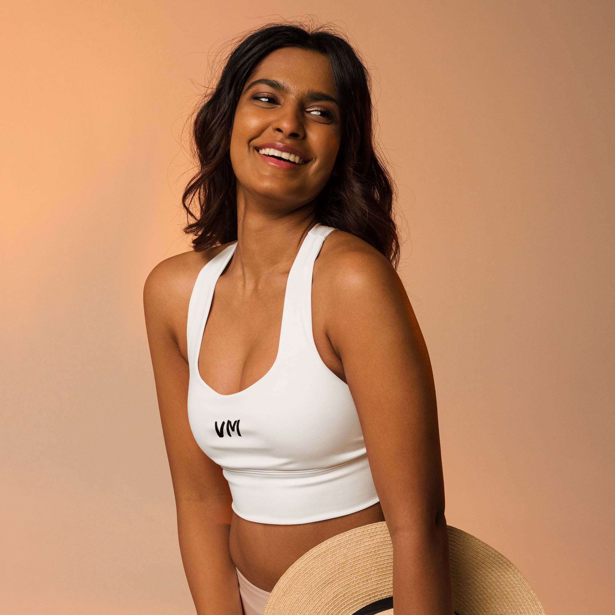 VM Special Longline Sports Bra This sports bra is the perfect workout top for exercising. The compression fabric along with double-layered front and shoulder straps ensures great support while running, jumping, or pumping iron. Wear it while exercising or