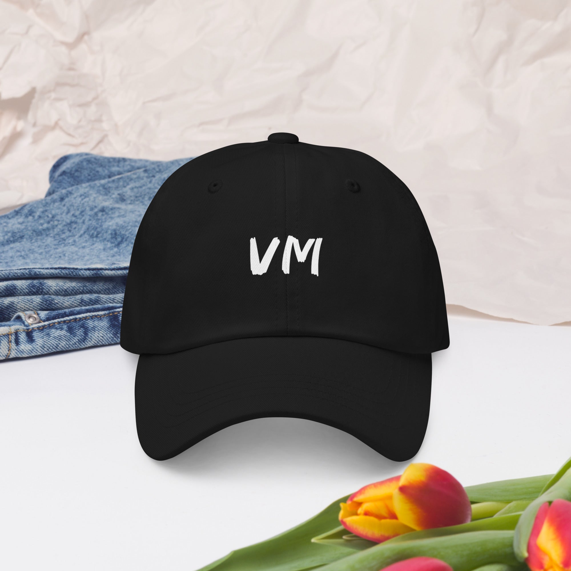 VM OFFICIAL HAT VM hats aren't just for everyone. This one's got a low profile with an adjustable strap and curved visor. • 100% chino cotton twill • Green Camo color is 35% chino cotton twill, 65% polyester • Unstructured, 6-panel, low-profile • 6 embroi