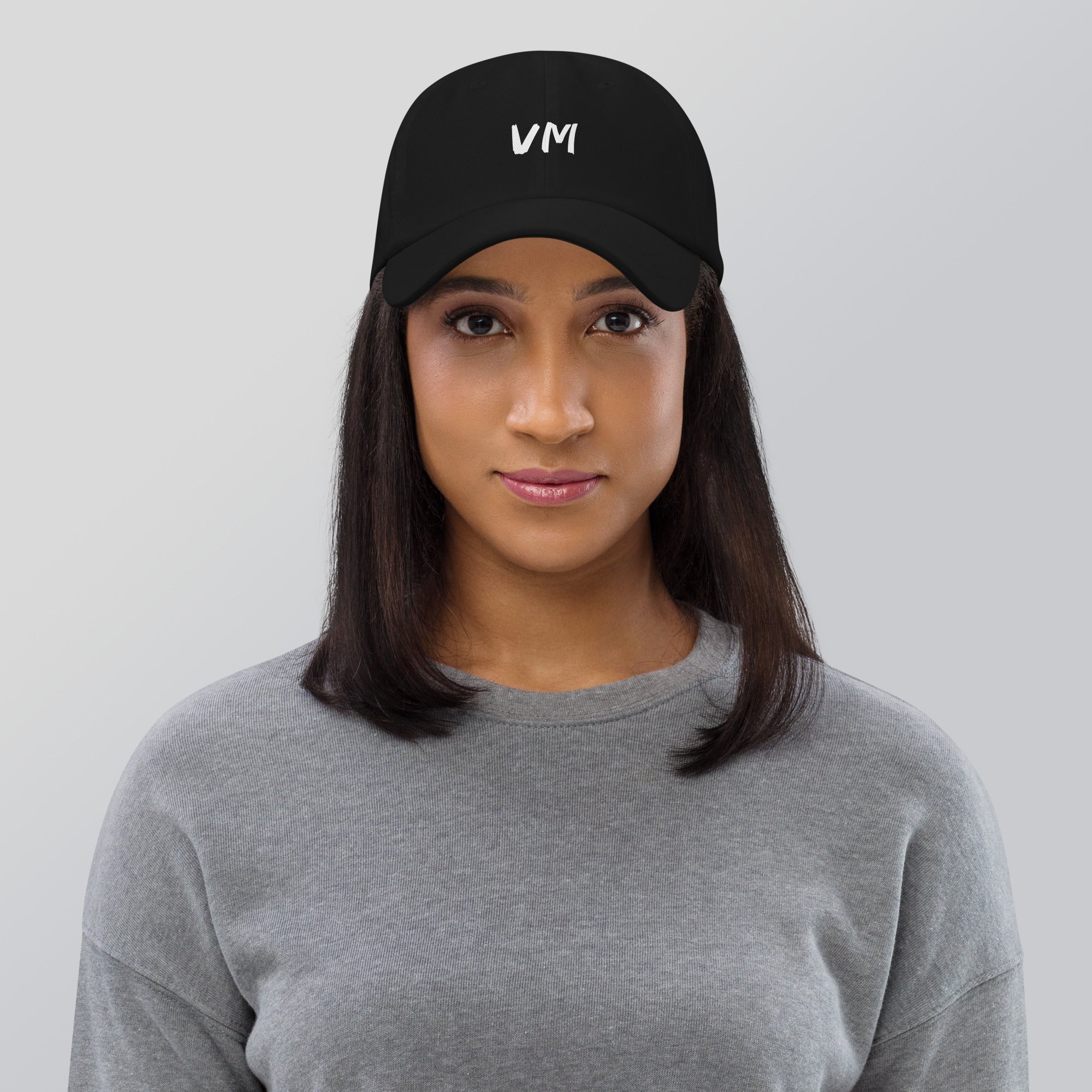 VM OFFICIAL HAT VM hats aren't just for everyone. This one's got a low profile with an adjustable strap and curved visor. • 100% chino cotton twill • Green Camo color is 35% chino cotton twill, 65% polyester • Unstructured, 6-panel, low-profile • 6 embroi