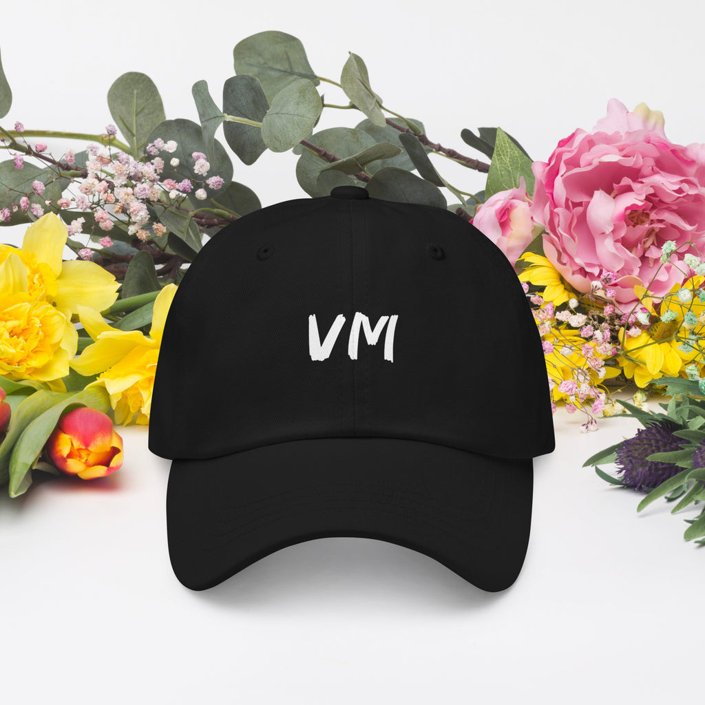 VM OFFICIAL HAT VM hats aren't just for everyone. This one's got a low profile with an adjustable strap and curved visor. • 100% chino cotton twill • Green Camo color is 35% chino cotton twill, 65% polyester • Unstructured, 6-panel, low-profile • 6 embroi