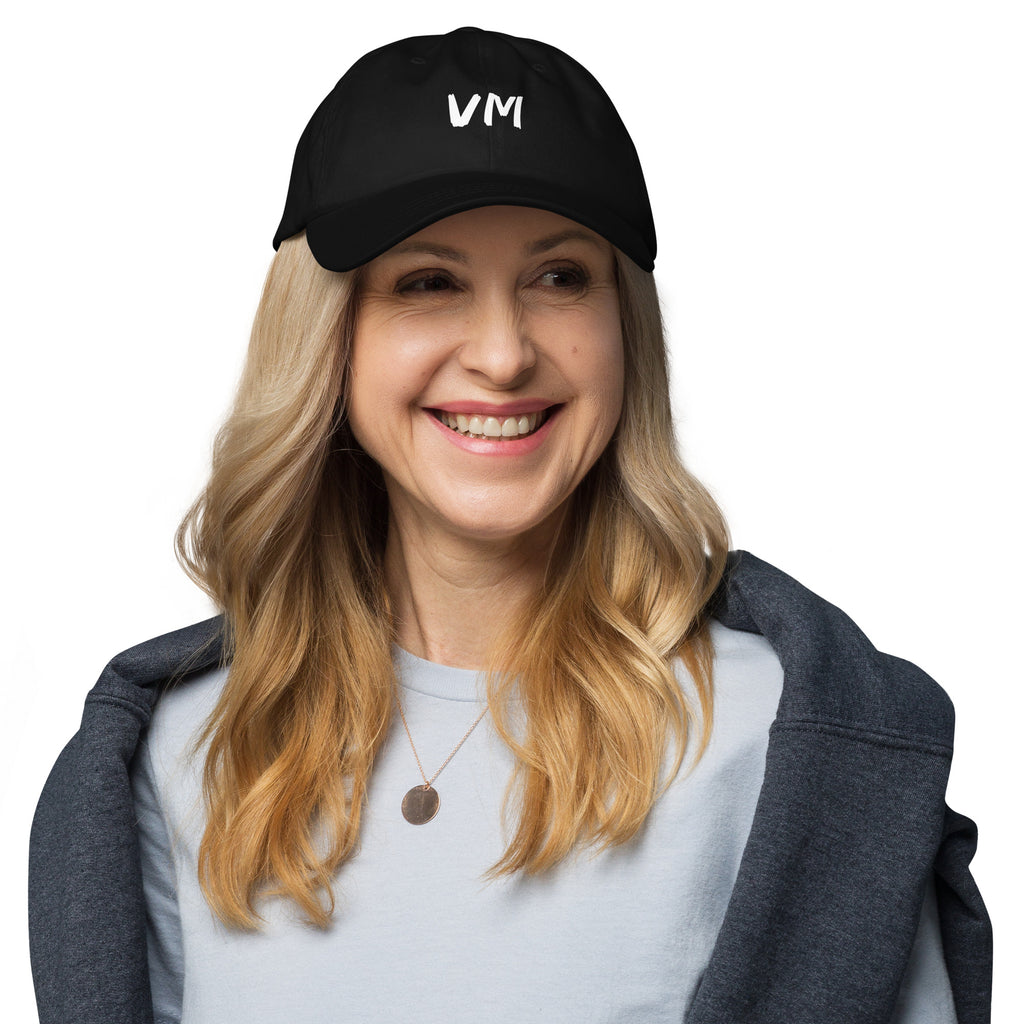 VM OFFICIAL HAT VM hats aren't just for everyone. This one's got a low profile with an adjustable strap and curved visor. • 100% chino cotton twill • Green Camo color is 35% chino cotton twill, 65% polyester • Unstructured, 6-panel, low-profile • 6 embroi