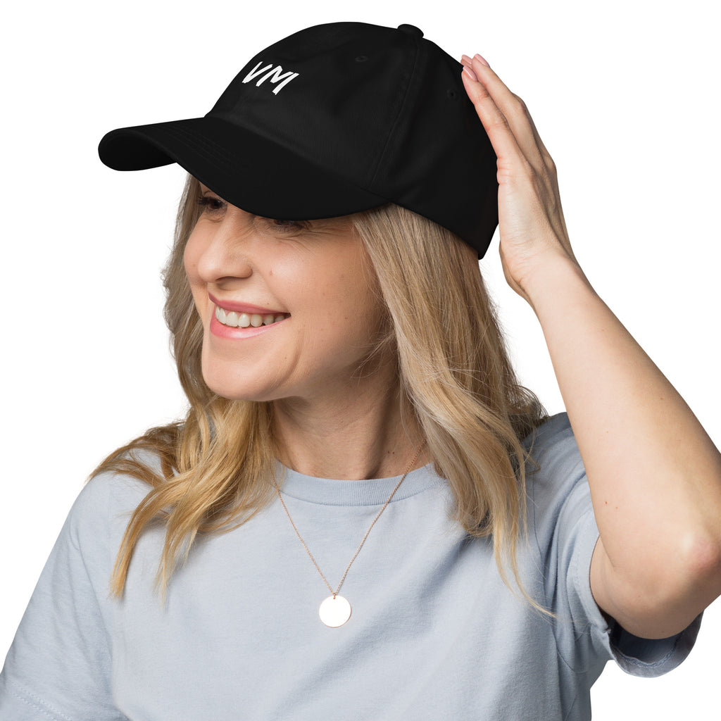 VM OFFICIAL HAT VM hats aren't just for everyone. This one's got a low profile with an adjustable strap and curved visor. • 100% chino cotton twill • Green Camo color is 35% chino cotton twill, 65% polyester • Unstructured, 6-panel, low-profile • 6 embroi
