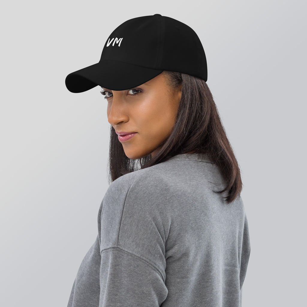 VM OFFICIAL HAT VM hats aren't just for everyone. This one's got a low profile with an adjustable strap and curved visor. • 100% chino cotton twill • Green Camo color is 35% chino cotton twill, 65% polyester • Unstructured, 6-panel, low-profile • 6 embroi