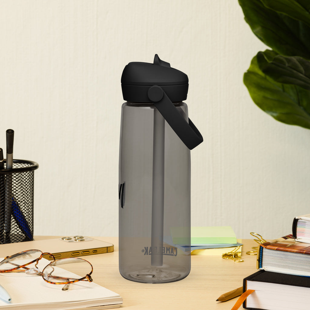 VM Flip Straw Water Bottle Stay hydrated in style with this flip straw water bottle, made from 50% recycled plastic. Resistant to stains, shattering, and odors, it keeps your drinks fresh, while the leak-proof cover and bite valve prevent spills. This ext