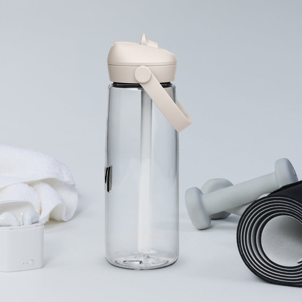 VM Flip Straw Water Bottle Stay hydrated in style with this flip straw water bottle, made from 50% recycled plastic. Resistant to stains, shattering, and odors, it keeps your drinks fresh, while the leak-proof cover and bite valve prevent spills. This ext
