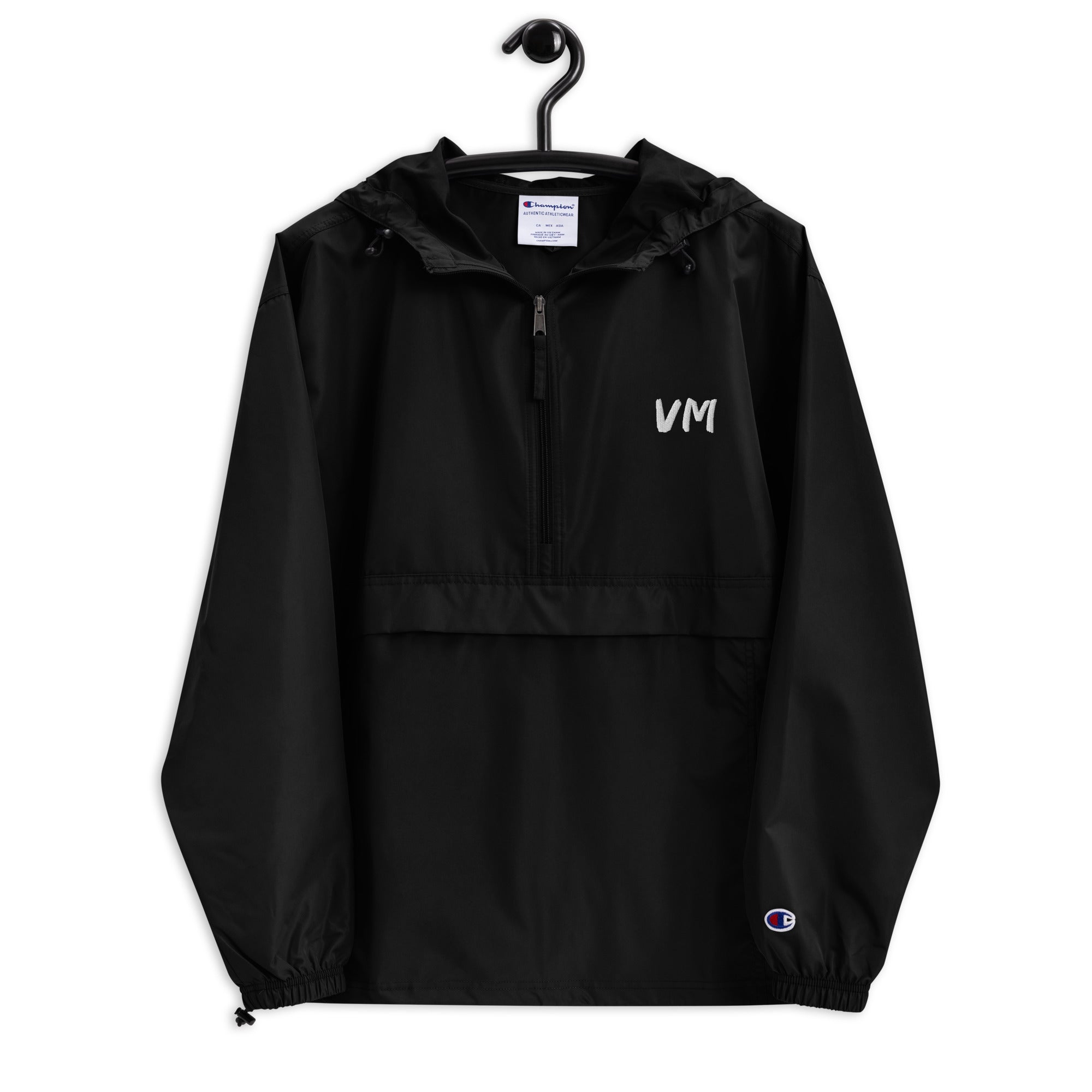 VM Official Embroidered Champion Packable Jacket Protect yourself from the elements with this Champion packable jacket. This wind and rain resistant polyester jacket with a detailed embroidery design has a practical hood, front kangaroo pocket, and zipped
