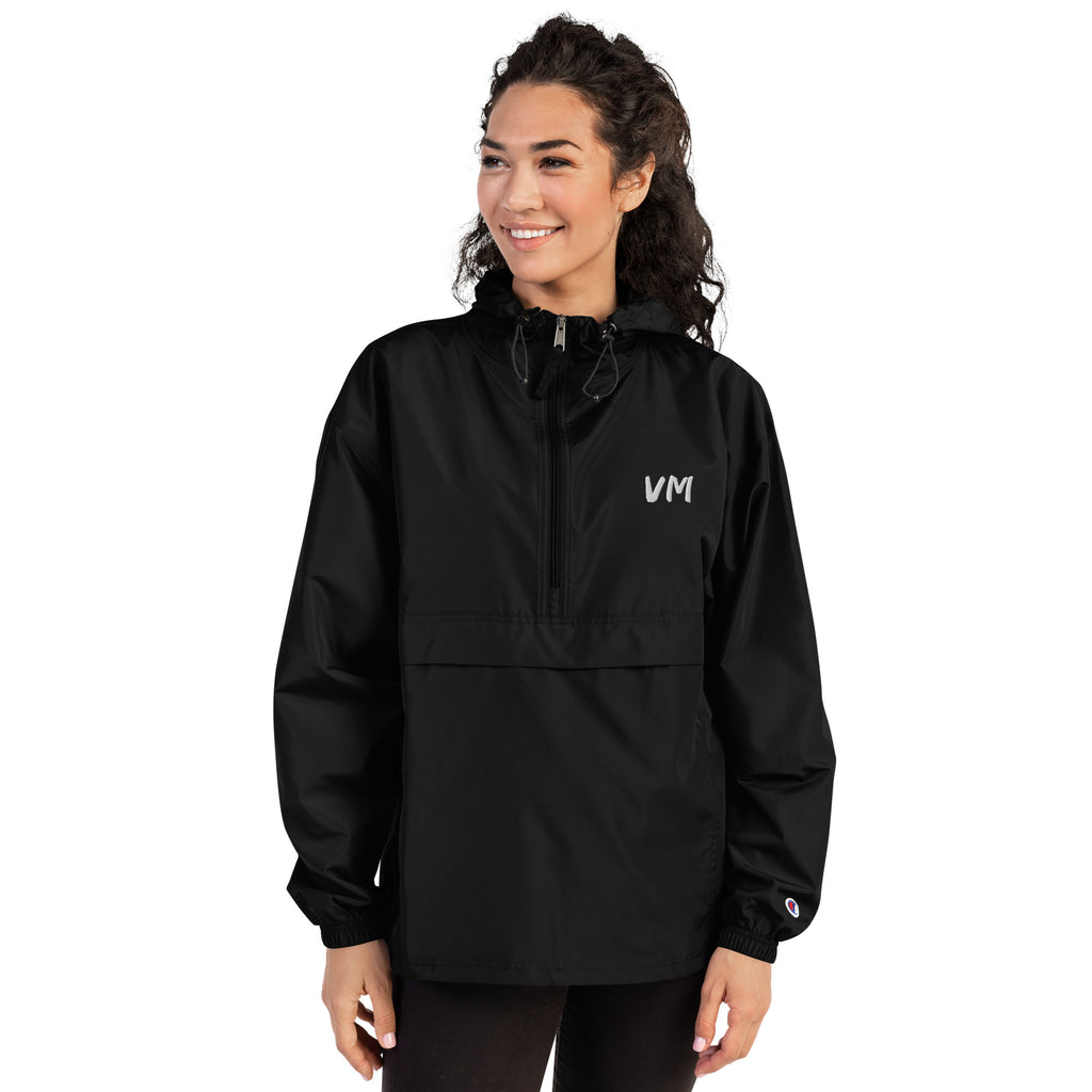 VM Official Embroidered Champion Packable Jacket Protect yourself from the elements with this Champion packable jacket. This wind and rain resistant polyester jacket with a detailed embroidery design has a practical hood, front kangaroo pocket, and zipped