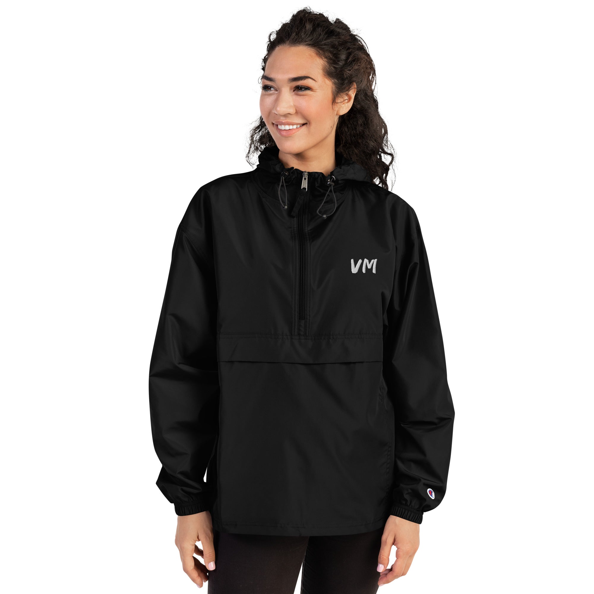 VM Official Embroidered Champion Packable Jacket Protect yourself from the elements with this Champion packable jacket. This wind and rain resistant polyester jacket with a detailed embroidery design has a practical hood, front kangaroo pocket, and zipped