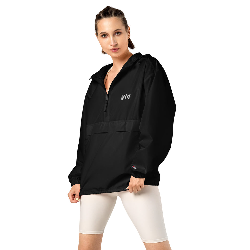 VM Official Embroidered Champion Packable Jacket Protect yourself from the elements with this Champion packable jacket. This wind and rain resistant polyester jacket with a detailed embroidery design has a practical hood, front kangaroo pocket, and zipped