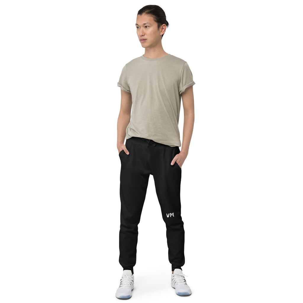 VM Fleece Sweatpants Well-made and lined with fleece, these comfortable Unisex Fleece Sweatpants will be your first choice for a casual everyday outfit—all you need to add is a graphic tee and sneakers to finish off the look. • 100% cotton face • 65% cott