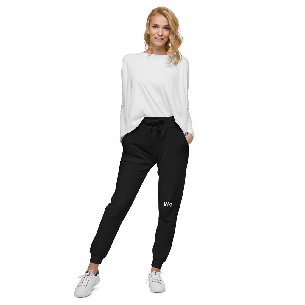 VM Fleece Sweatpants Well-made and lined with fleece, these comfortable Unisex Fleece Sweatpants will be your first choice for a casual everyday outfit—all you need to add is a graphic tee and sneakers to finish off the look. • 100% cotton face • 65% cott