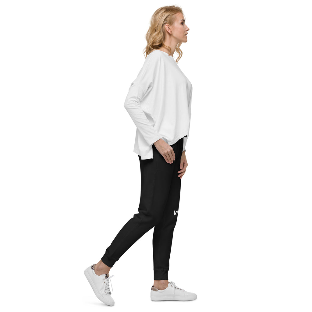 VM Fleece Sweatpants Well-made and lined with fleece, these comfortable Unisex Fleece Sweatpants will be your first choice for a casual everyday outfit—all you need to add is a graphic tee and sneakers to finish off the look. • 100% cotton face • 65% cott