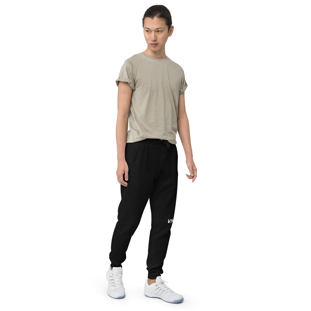 VM Fleece Sweatpants Well-made and lined with fleece, these comfortable Unisex Fleece Sweatpants will be your first choice for a casual everyday outfit—all you need to add is a graphic tee and sneakers to finish off the look. • 100% cotton face • 65% cott