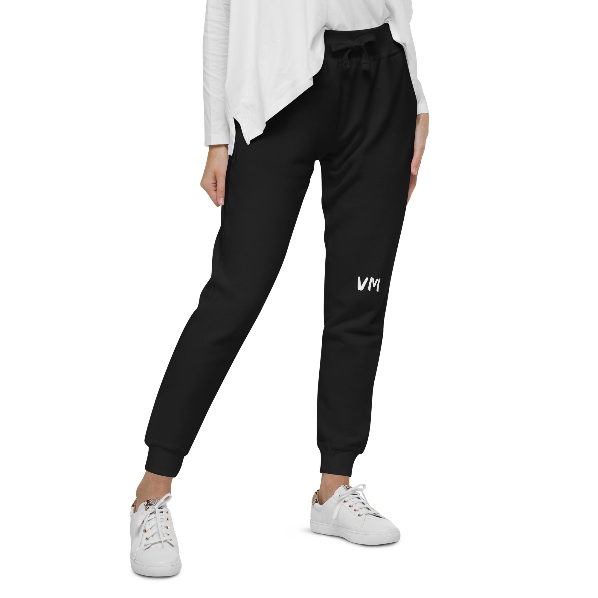 VM Fleece Sweatpants Well-made and lined with fleece, these comfortable Unisex Fleece Sweatpants will be your first choice for a casual everyday outfit—all you need to add is a graphic tee and sneakers to finish off the look. • 100% cotton face • 65% cott