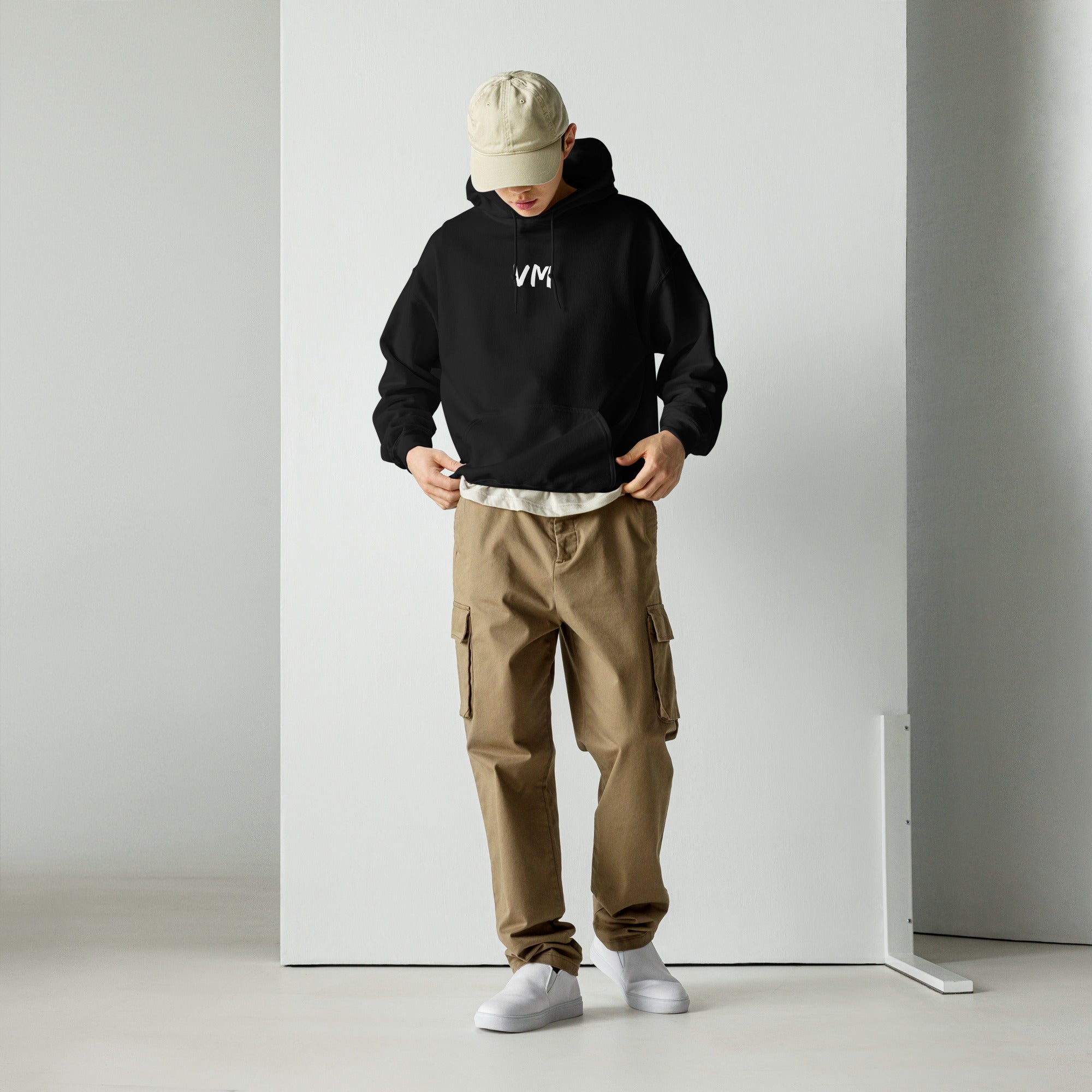 VM's Unisex Hoodie Everyone needs a cozy go-to hoodie to curl up in, so go for one that's soft, smooth, and stylish. It's the perfect choice for cooler evenings! • 50% pre-shrunk cotton, 50% polyester Heather Sport Dark Navy is 40% cotton, 60% polyester •